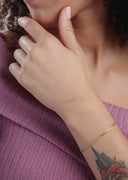 PULSERA GRUMETA BAÑO ORO